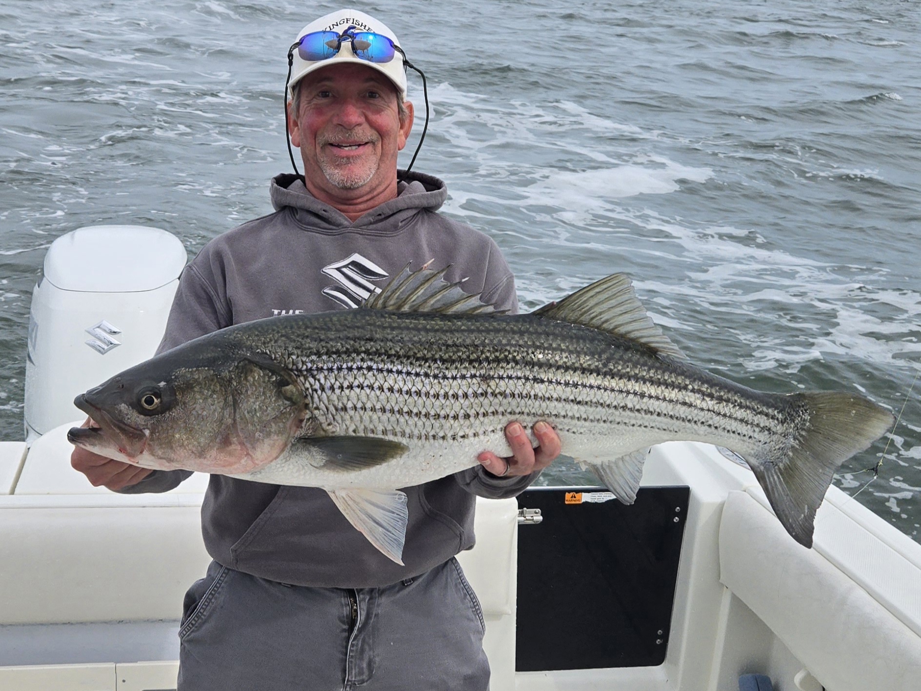 Guest holding their catch (Trophy Photo)