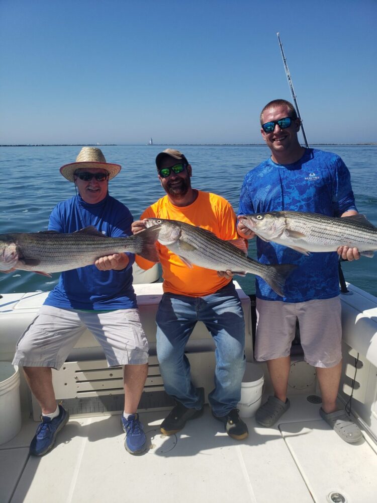 guest holding their catch (trophy photo)